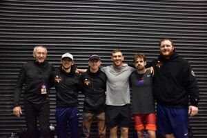 Olympic Trials qualifiers and Coach Dan Chandler